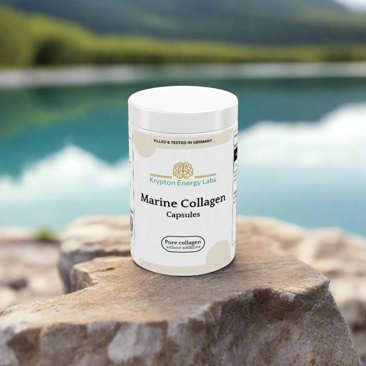 A container of Krypton Energy Labs' Marine Collagen is placed on a rock. The label emphasizes the product's purity, containing only collagen with no additives. Against a serene lake backdrop with trees and mountains, this supplement promotes joint health and skin health naturally.